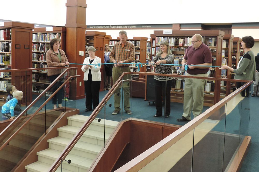 Library lower level ribbon cutting